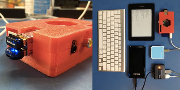 Der technische Aufbau im Detail: Man sieht Raspberry Pi, Kindle Paperwhite, Apple Bluetooth-Tastatur, WLAN-Router und USB-Hub.